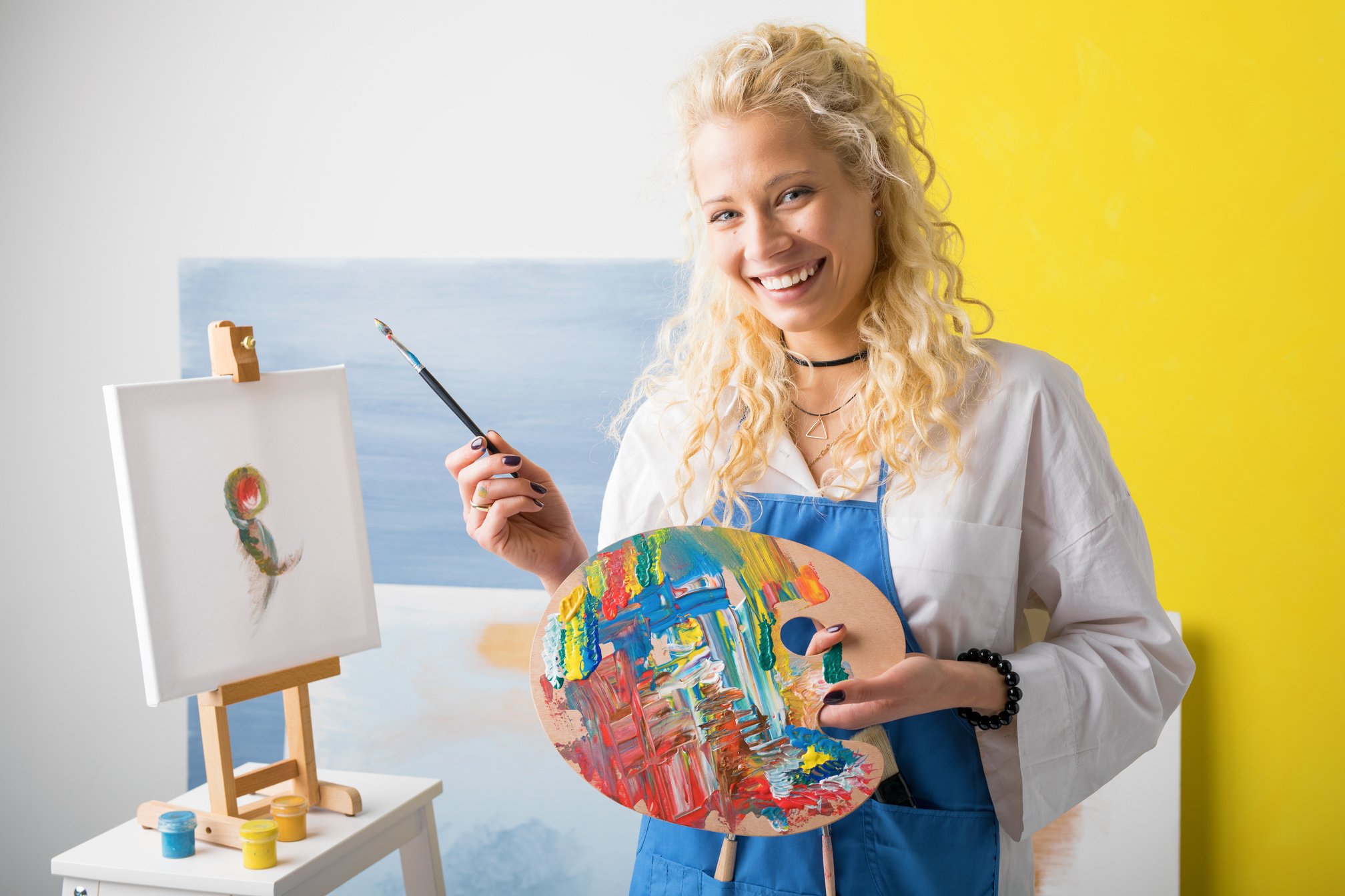 Happy Female Artist Painting